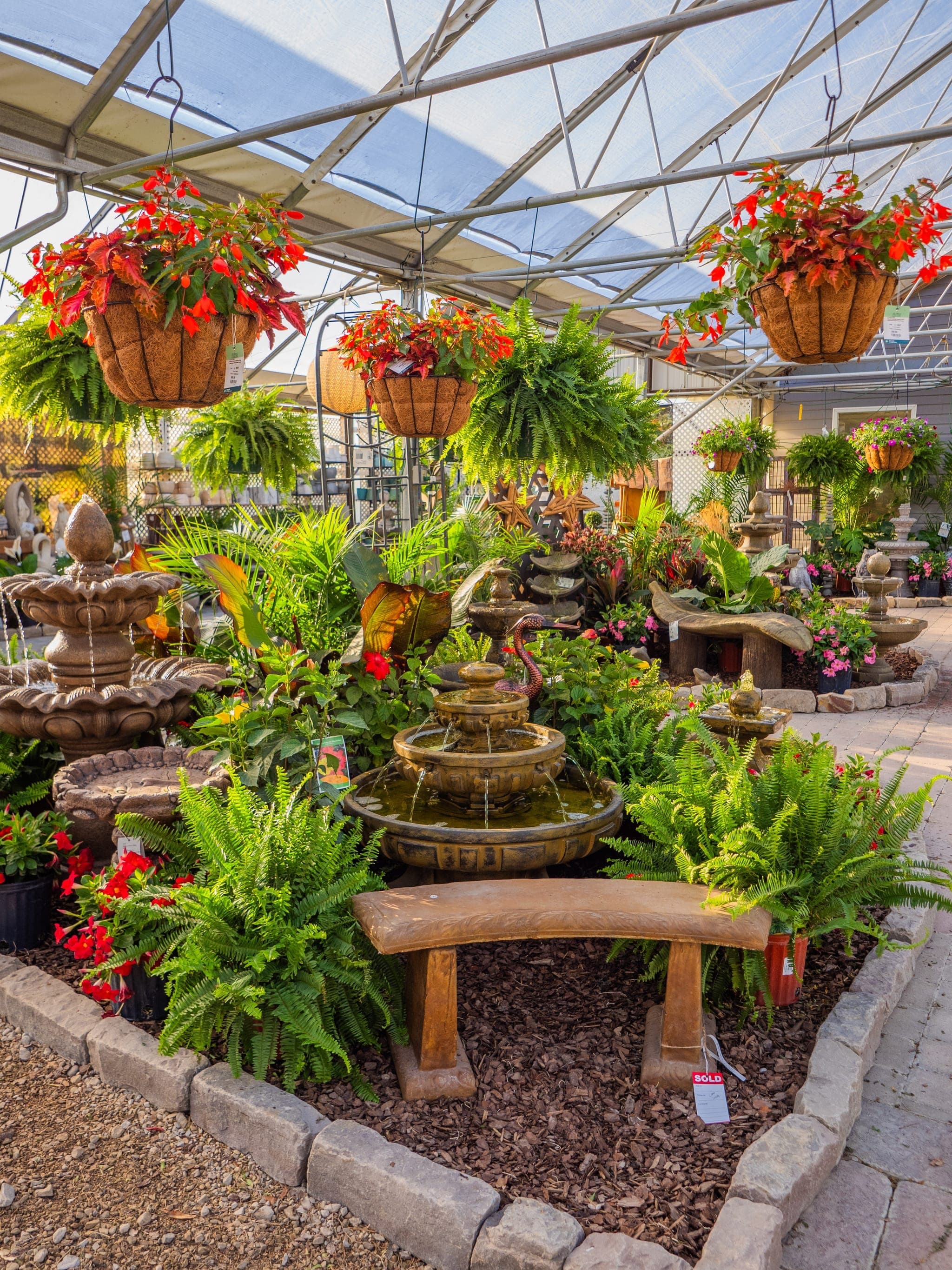 Garden decor and pottery displays at Colonial Classics
