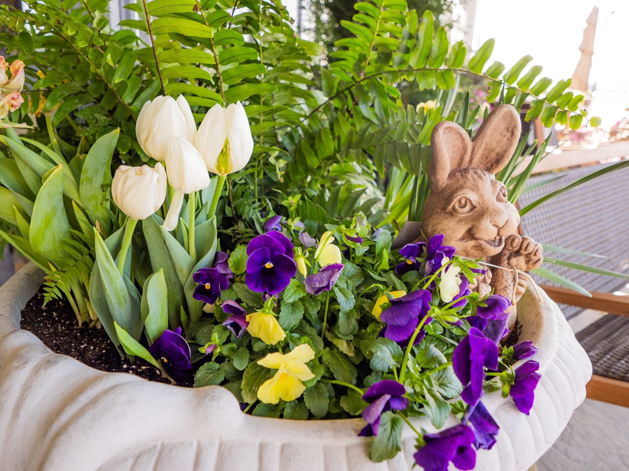 Spring planter arrangement with colorful flowers