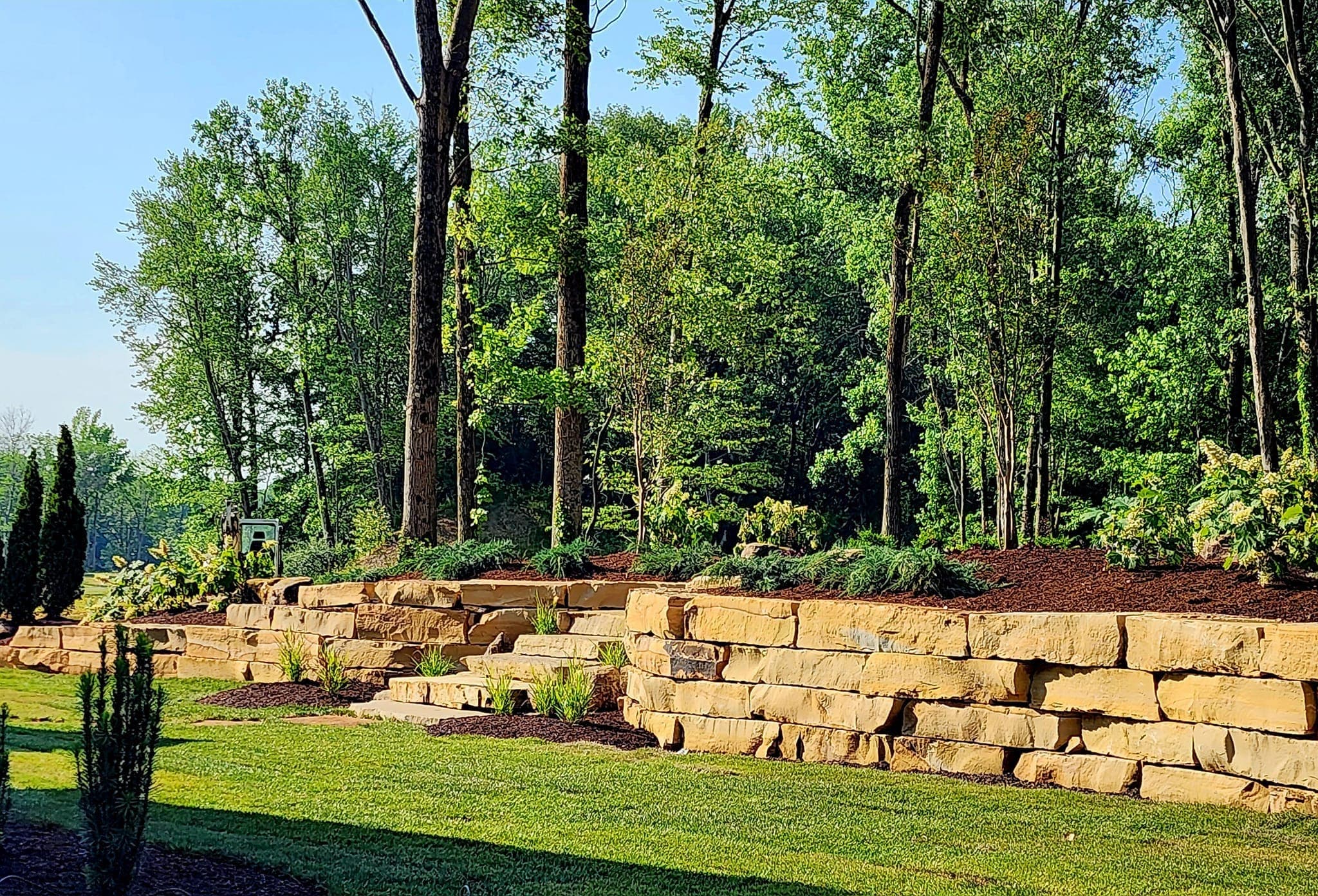 Multi-level retaining wall with landscaping
